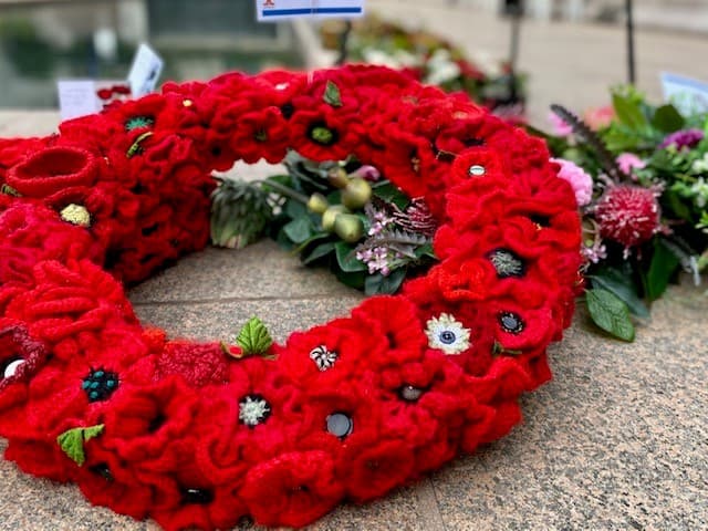 Wreath of red woven poppies