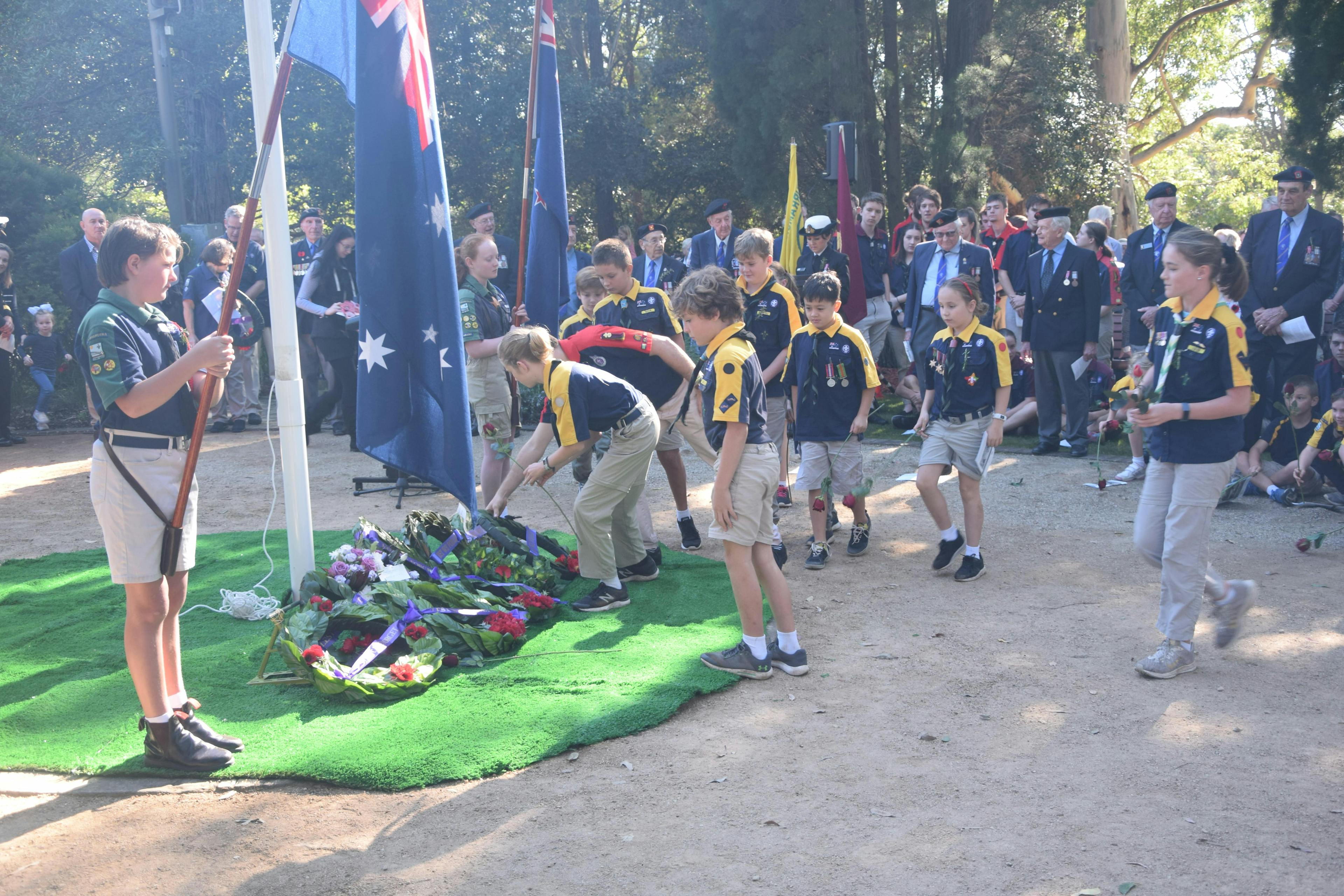 1st Turramurra Scouts laying wreath during war memorial ceremony