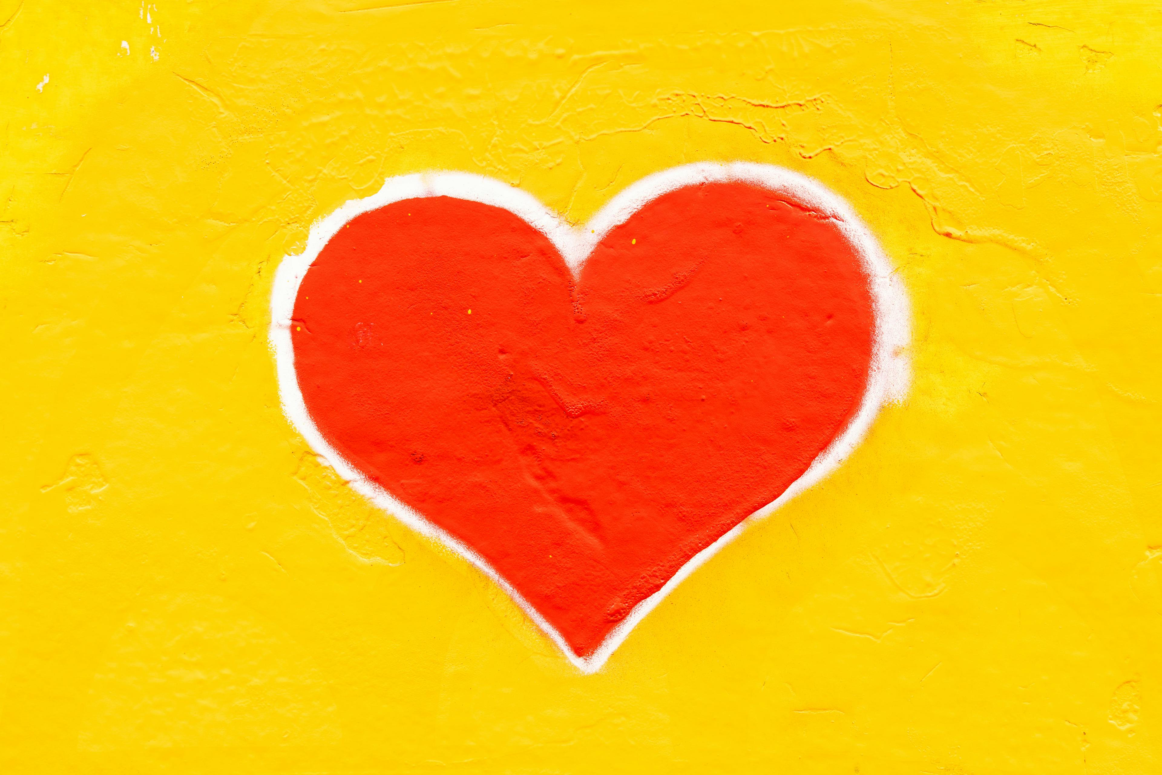 Red heart with a yellow background